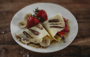 Photo by Eileen lamb: https://www.pexels.com/photo/photo-of-crepe-beside-strawberry-3225499/